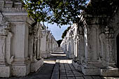 Myanmar - Mandalay, Kuthodaw Pagoda. 729 white pitaka pagodas contain the Tipitaka, the sacred texts of Theravada Buddhism. 